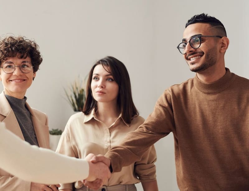 Grand Metro Developers team greeting a client